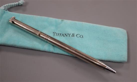 A Tiffany & Co sterling pen, with Tiffany pouch.